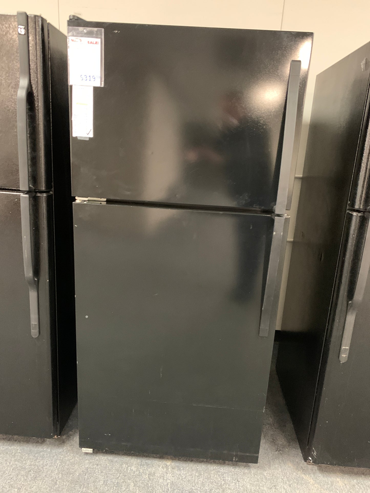 Whirlpool Black Top Bottom Refrigerator.