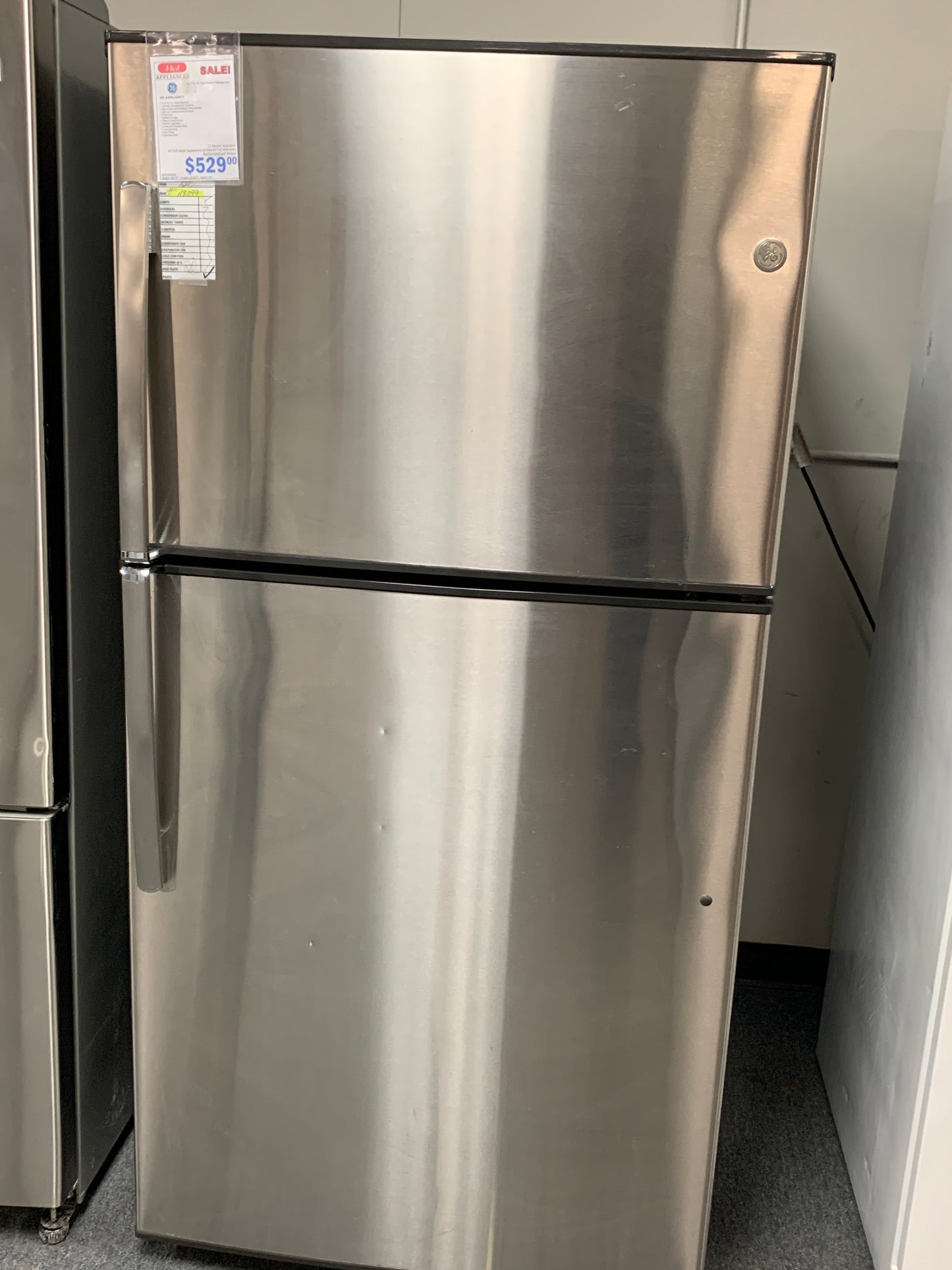 GE Stainless Steel Top Bottom Refrigerator.