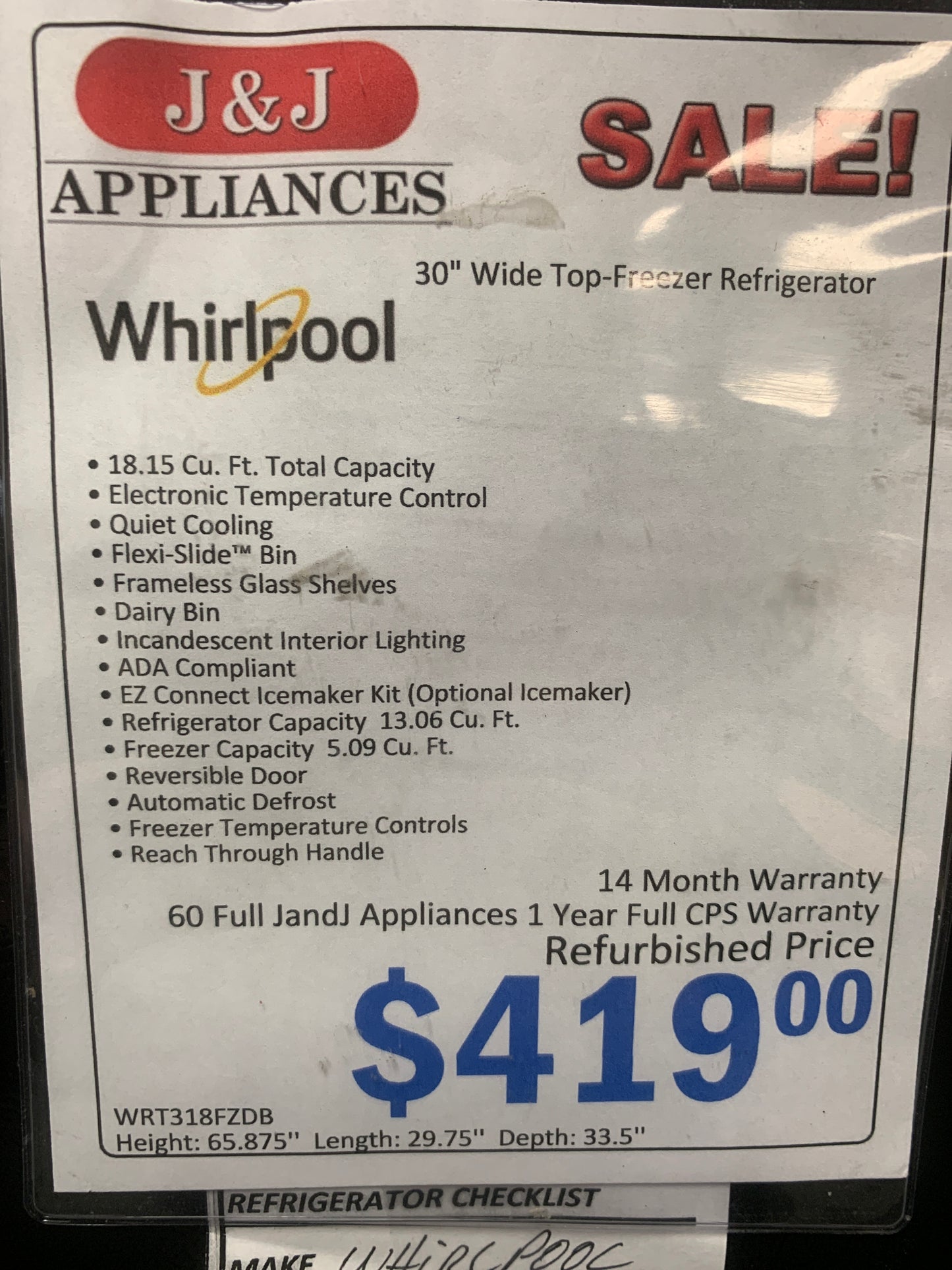 Whirlpool Black top and Bottom Refrigerator.